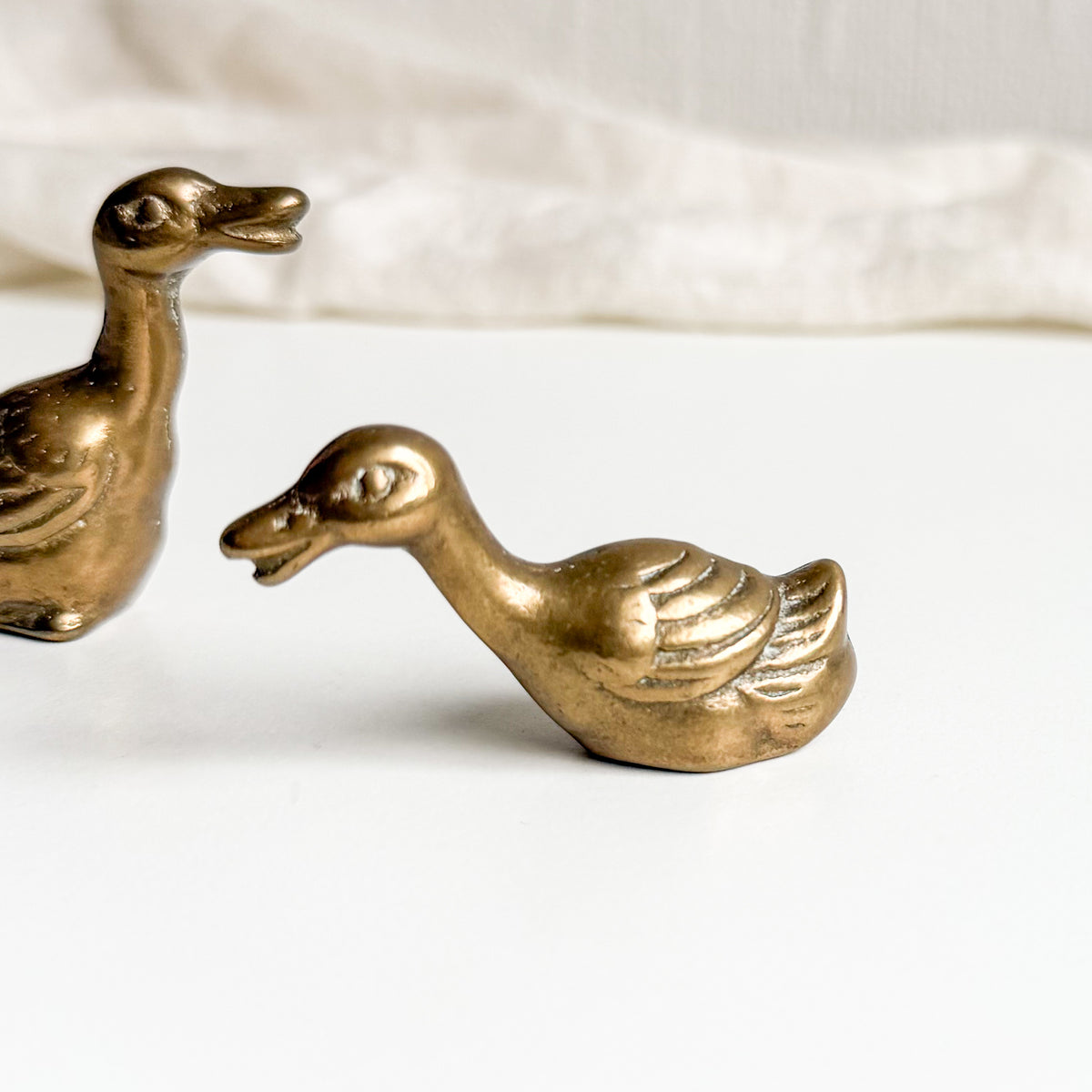 Pair of Small Brass Geese