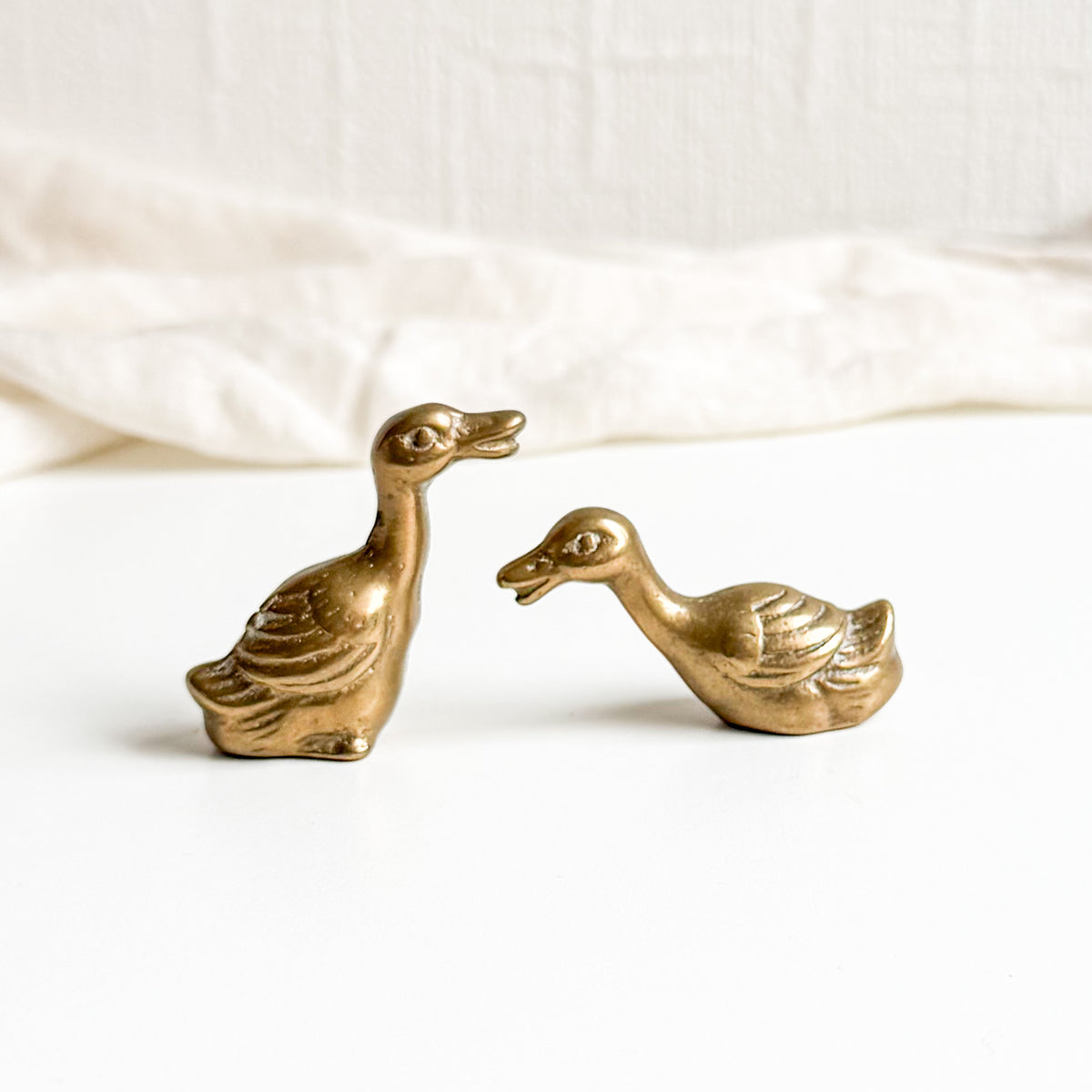 Pair of Small Brass Geese