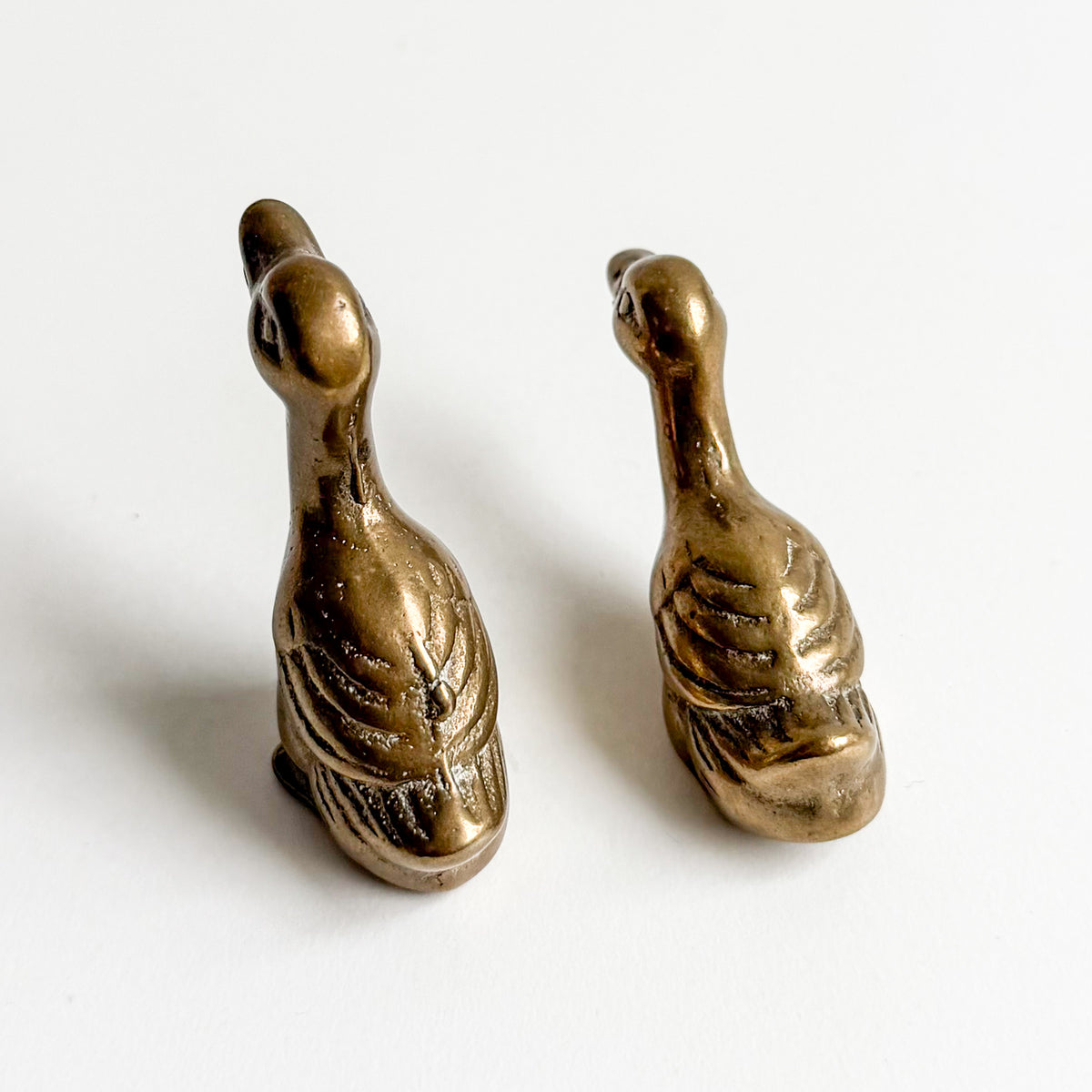 Pair of Small Brass Geese